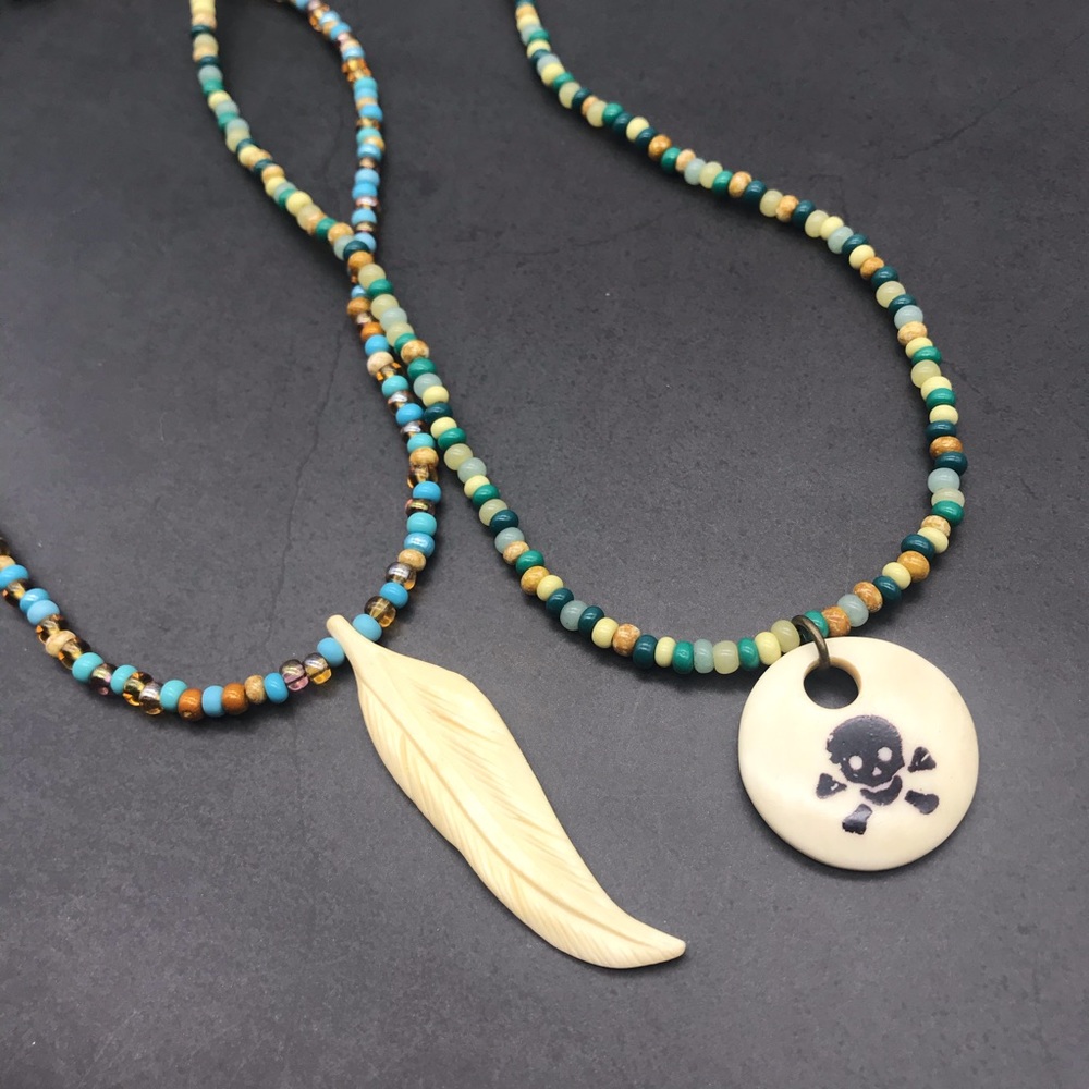 Handmade OOAK Carved Feather & Skull Necklaces!